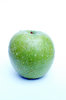 Green apple with waterdrops.