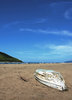 Abandoned boat in beach