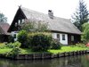 cottage in spring at the water