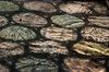 Gleam on medieval stone floori