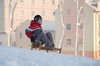 Boy on the sledge 4