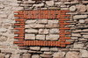 Old wall with blind window
