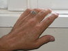 hand on window sill
