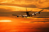 Airplane in sunset