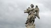 Angel in cloudy sky