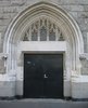 modern door in old portal