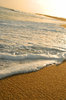 Wave foam on the shore.