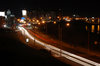 Cars by the promenade at night