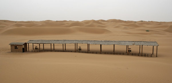 Desert car-park: A parking area for quad bikes in the Tengger Desert, China.