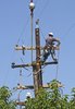 Men Replacing Power Pole