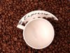 Coffee beans and an espresso c