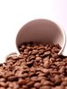 Coffee beans and an espresso c