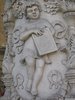 stucco girl figurine