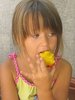 girl eating peach