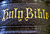 old black Bible spine