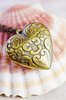 Metal decorate heart on sea sh