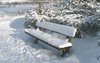 Snow covered bench