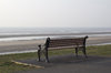 Bench by the sea at dawn