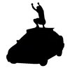 A dancer on a car's roof