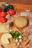 Pizza dough and ingredients