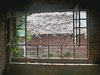 window with view of a ruined r